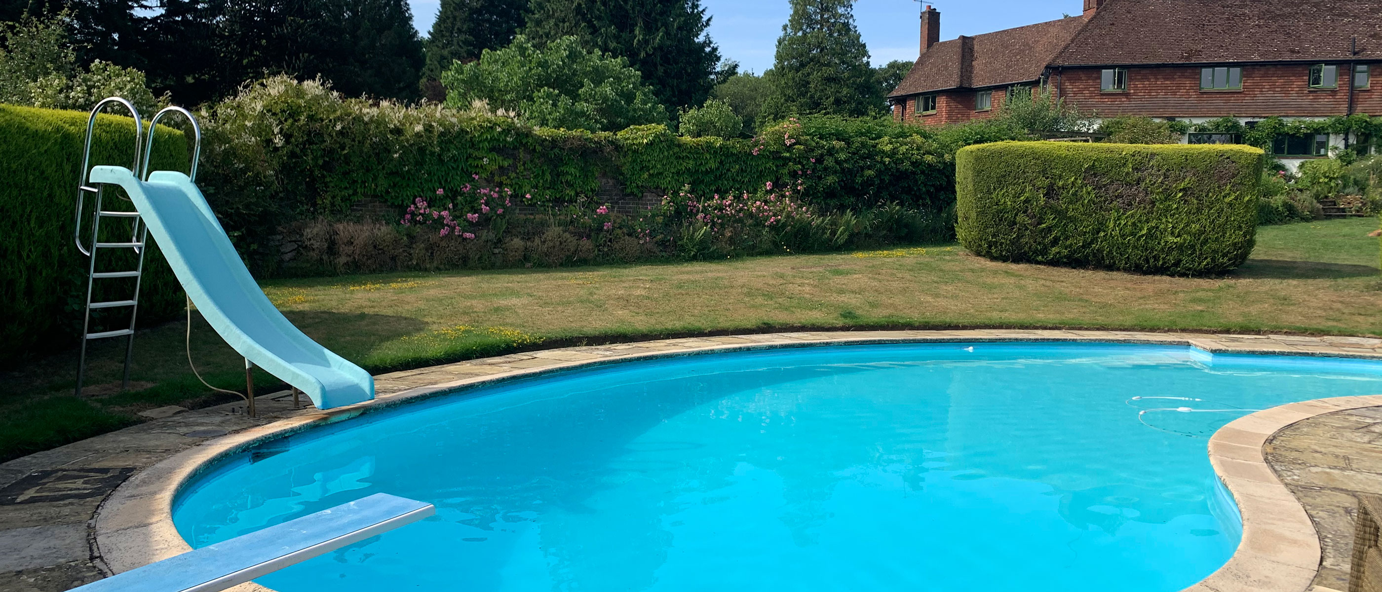 Tor Hatch holiday home swimming pool for groups in Shere Surrey